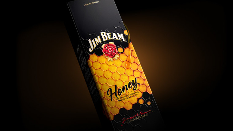 金黃色六邊形圖案 Jim Beam 蜂蜜包裝設計，極具食欲感