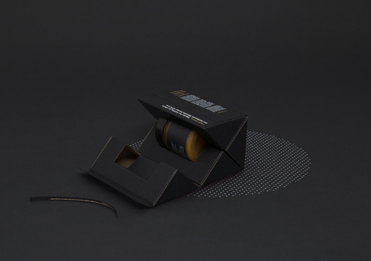 真蜜公司黑色超酷風格蜂蜜包裝設計-上海包裝設計公司