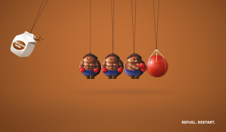 巧克力牛奶平面創意廣告設計之牛頓擺”充值，重新開始“篇