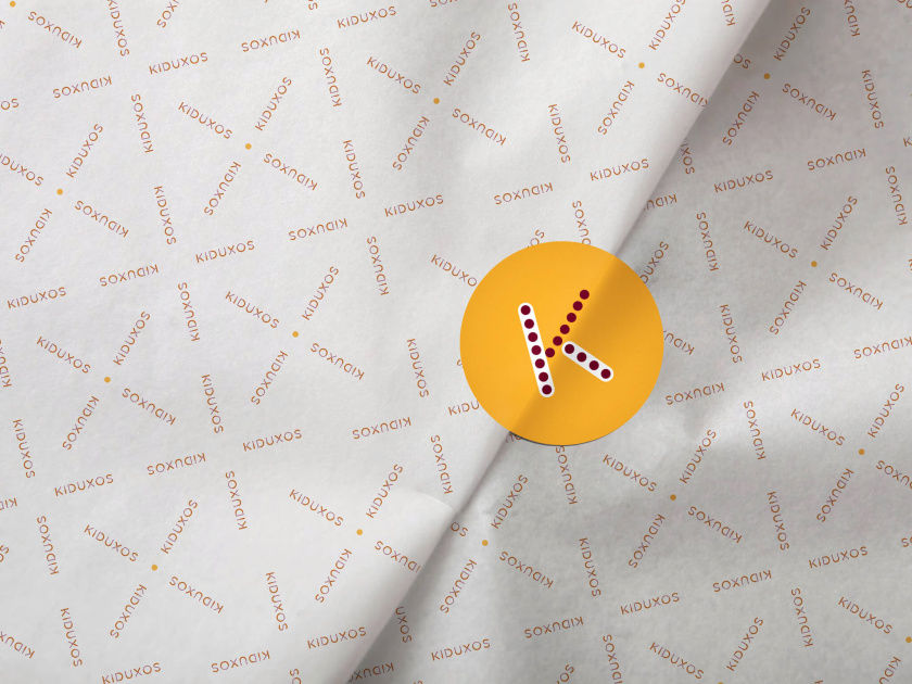 KIDUXOS兒童商店品牌logo設計vi設計與店鋪空間設計