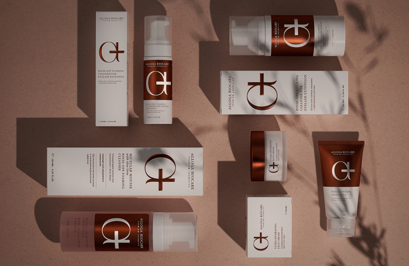 Alloga Biocare 高端化妝品包裝設計，古銅色“ a+”連字形成醫學和美學關系的符號