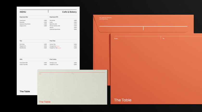 The Table 電信品牌vi視覺識別設計空間設計及導視，與桌子結合的長長的T型水平線元素