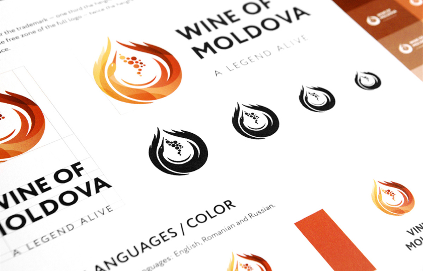 摩爾多瓦釀酒師協會logo設計“地圖+酒滴+葡萄+白鸛展翅+火”