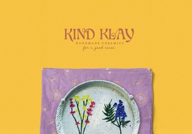 自制陶瓷品牌的淡紫色和芥末標志設計