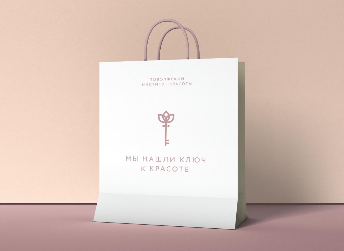 伏爾加整形外科和醫(yī)學美容中心標志設(shè)計品牌形象設(shè)計，暗桃紅與金色配色